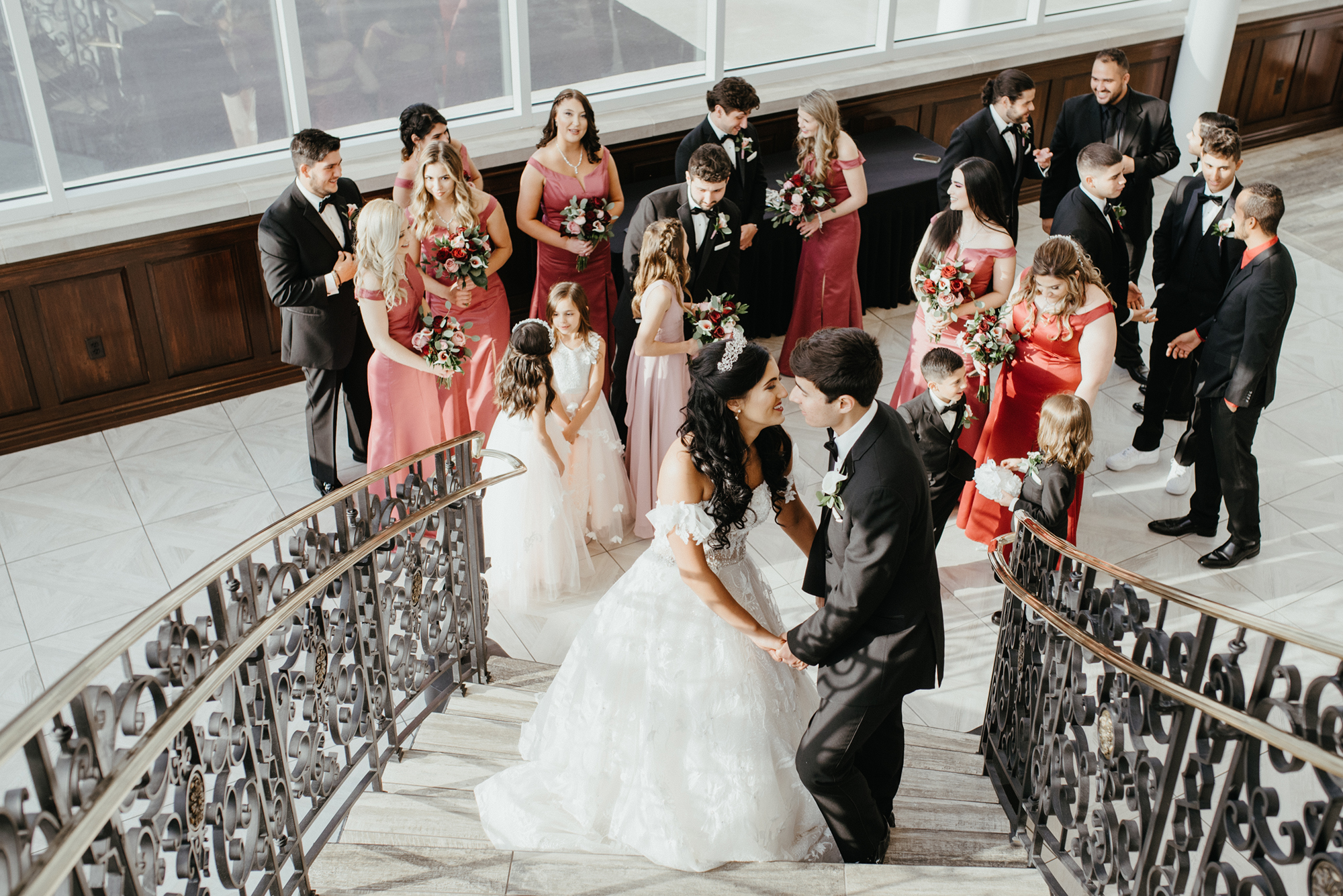 Wedding Party at the bottom of one of the dueling staircases leading to the Willows' Atrium.